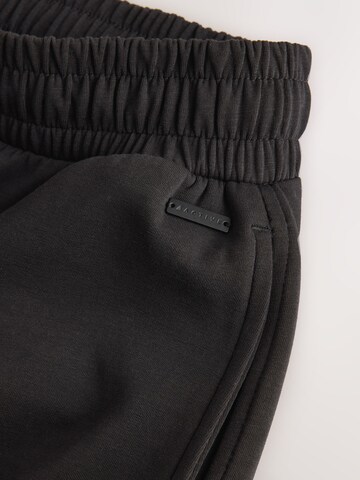 Barrel Pantalon de sport Next en noir