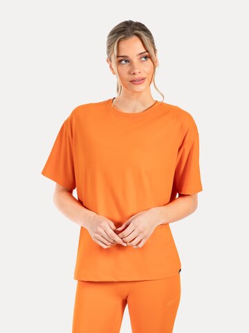 Smilodox Damen T-Shirt Oversize in Orange: Vorderseite
