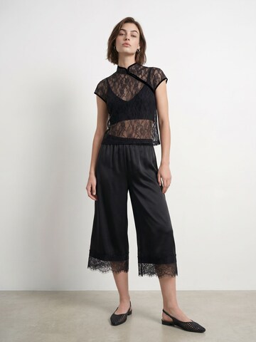 HYPEDROP - Blusa 'Kenzie' en negro