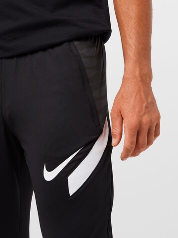 NIKE Slimfit Sportovní kalhoty 'Strike' – černá