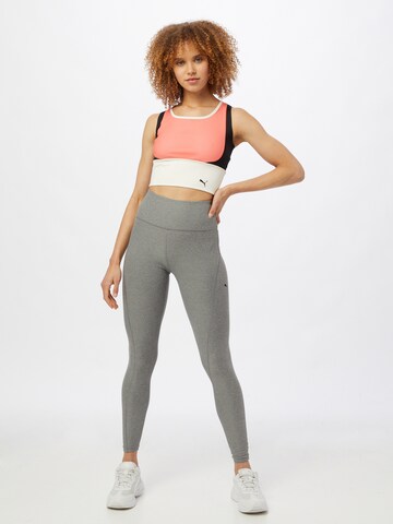 Skinny Pantaloni sport de la PUMA pe gri