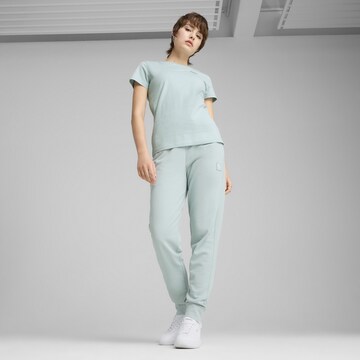 PUMA Tapered Sportbroek 'Ess Elevated' in Groen