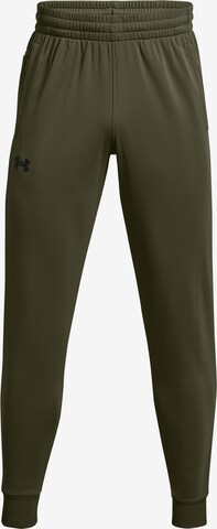 UNDER ARMOUR Tapered Workout Pants in Green: front