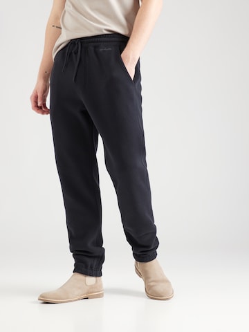 HOLLISTER - Tapered Calças em preto: frente