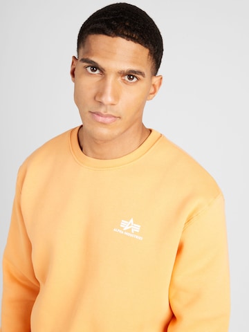 ALPHA INDUSTRIES Sweatshirt in Oranje