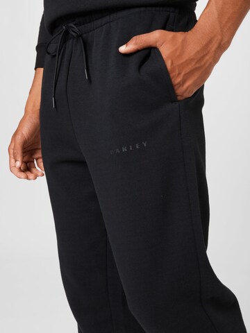 Tapered Pantaloni sport 'CANYON' de la OAKLEY pe negru