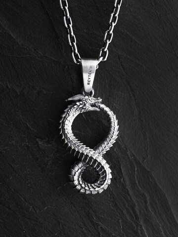 Brelocuri 'OUROBOROS' de la REYTEL pe argintiu