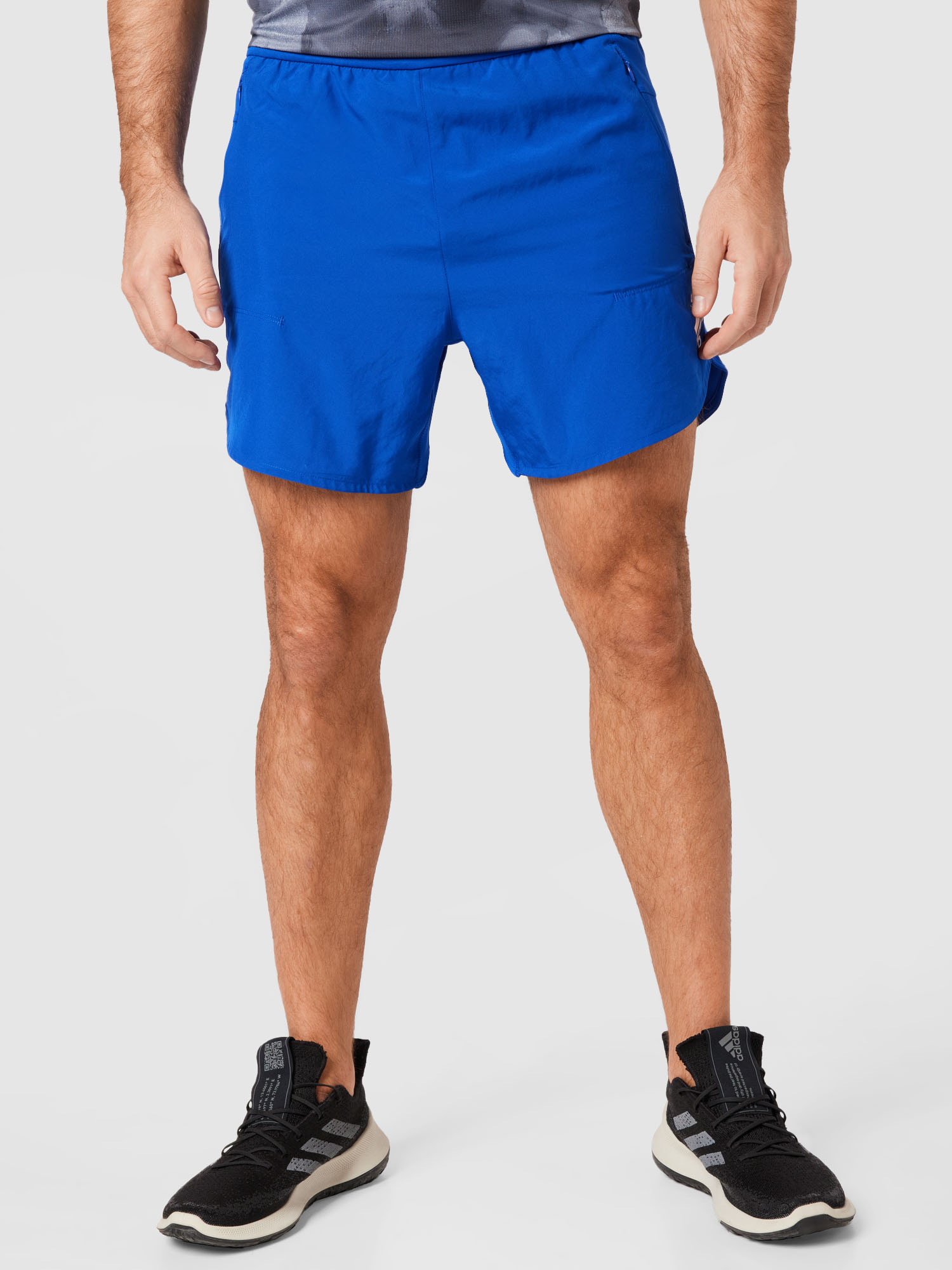 Odzież itDv4 ADIDAS PERFORMANCE Spodnie sportowe Designed for Training w kolorze Niebieskim 