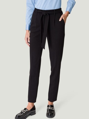 zero Loose fit Pants in Black: front