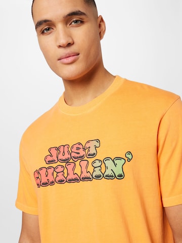 Superdry - Camiseta en naranja