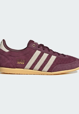 Baskets basses ADIDAS ORIGINALS en rouge