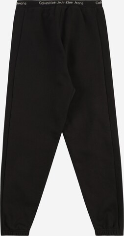 juoda Calvin Klein Jeans Siaurėjantis Kelnės 'INTARSIA'