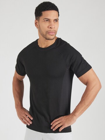 T-Shirt fonctionnel 'The Training Day' Fabletics en noir : devant