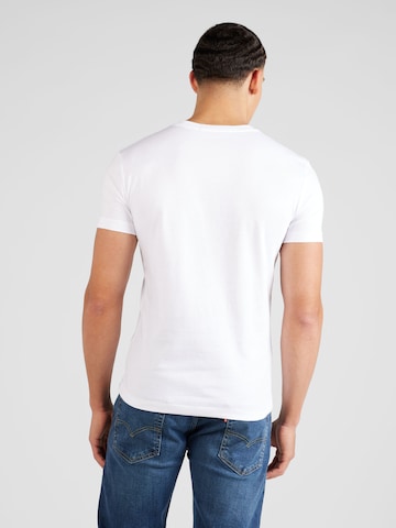 Calvin Klein Jeans قميص بلون أبيض