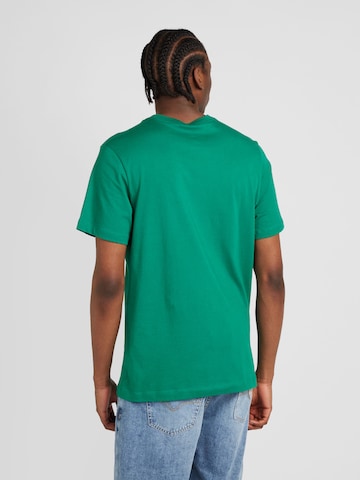 Regular fit Tricou 'CLUB' de la Nike Sportswear pe verde