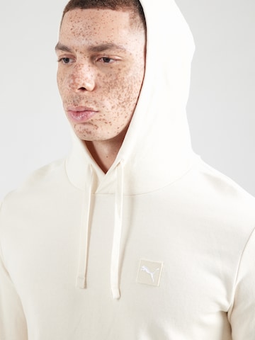 PUMASportska sweater majica 'Essentials Elevated' - bijela boja