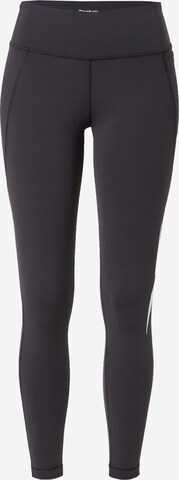 Skinny Pantalon de sport 'Lux' Reebok en noir : devant