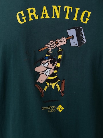 Bavarian Caps Shirt 'T-Shirt "Grantler Klub: Joe Dalton" - dunkelgrün'‌‌‌‌‌‌‌‌‌‌ in Grün