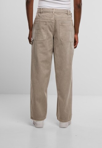 Nike Sportswear Baggy Jeans in Grau