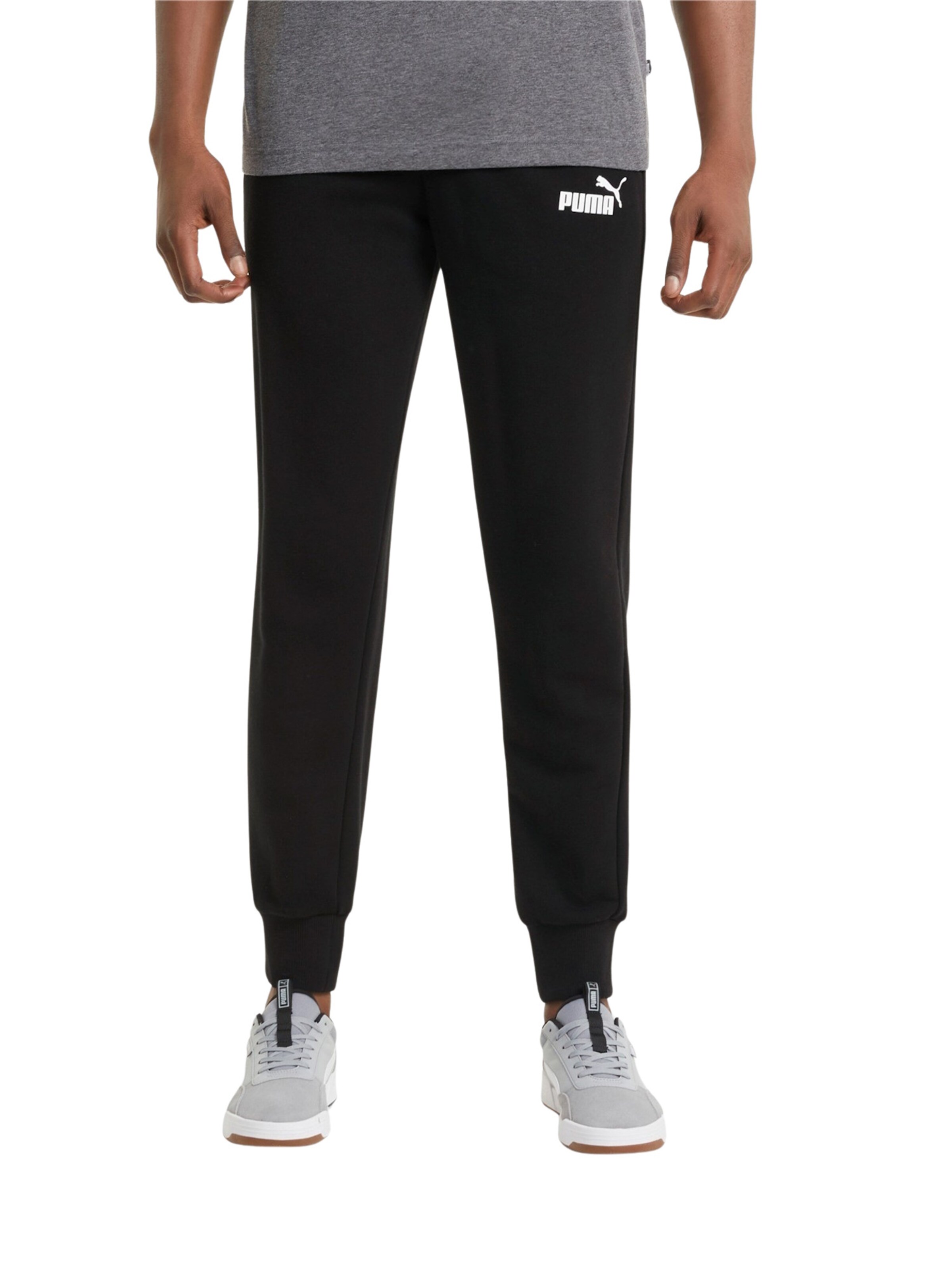 PUMA Tapered Workout Pants in Black: front