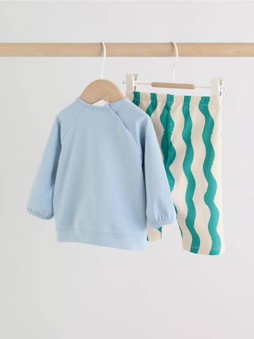 Set Next en bleu