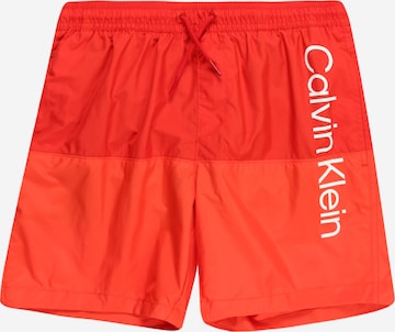 Calvin Klein Swimwear Board Shorts in Red: front