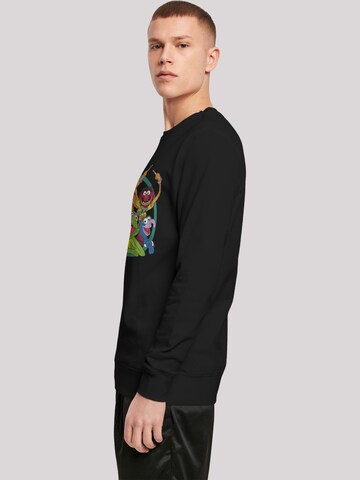 F4NT4STIC Sweatshirt 'Disney The Muppets Group Circle' in Schwarz