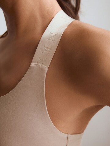 Bustino Reggiseno sportivo di Next in beige