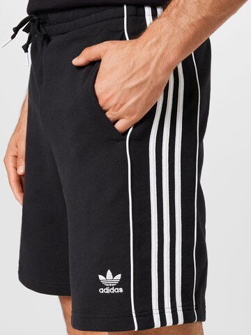 ADIDAS ORIGINALS Normalny krój Spodnie 'Rekive' w kolorze czarny