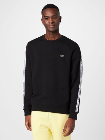 Sweat-shirt LACOSTE en noir : devant