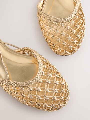 Next Ballerinasko med rem 'Forever Comfort' i guld