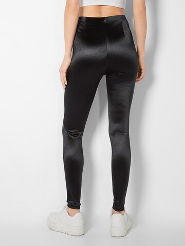 Bershka Skinny Leggingsit värissä musta