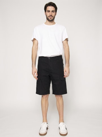 Carhartt WIP Baggy Cargojeans 'Aviation' in Zwart: voorkant