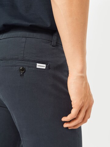 Lindbergh - Slimfit Pantalón chino 'Superflex' en azul