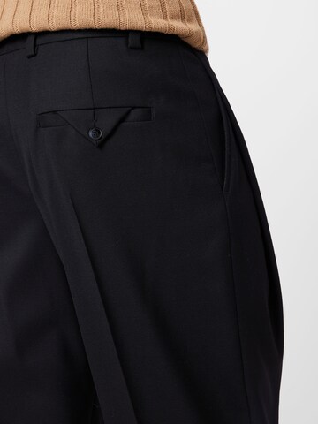 Loosefit Pantaloni con piega frontale 'Faru224' di HUGO Red in nero