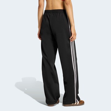 Wide leg Pantaloni di ADIDAS ORIGINALS in nero