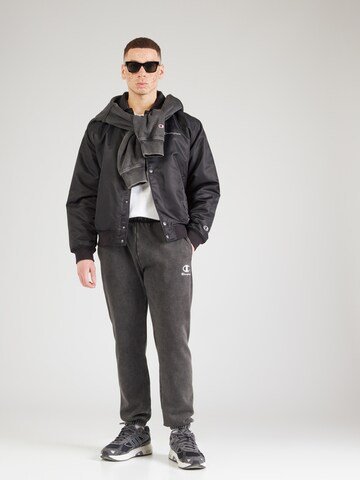 Tapered Pantaloni di Champion Authentic Athletic Apparel in nero