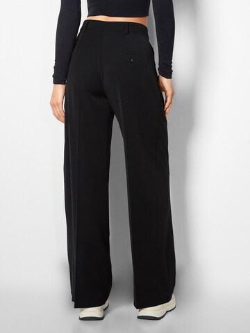 Bershka Loose fit Pleat-Front Pants in Black