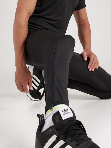 Skinny Pantaloni sportivi 'Adizero' di ADIDAS PERFORMANCE in nero