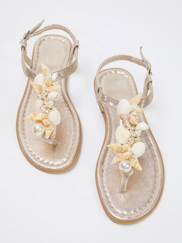 Tongs Trendyol en or