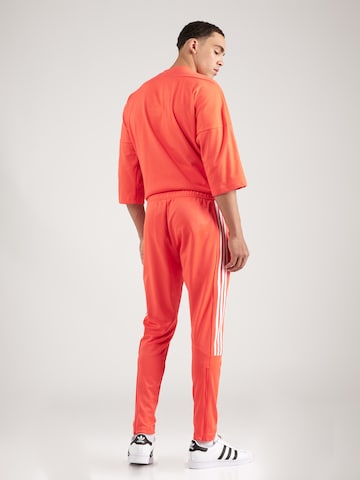 ADIDAS SPORTSWEARTapered Sportske hlače 'Tiro Material Mix' - crvena boja