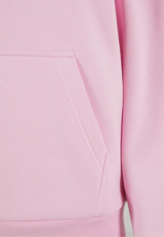 rožinė Urban Classics Megztinis be užsegimo 'Fluffy'