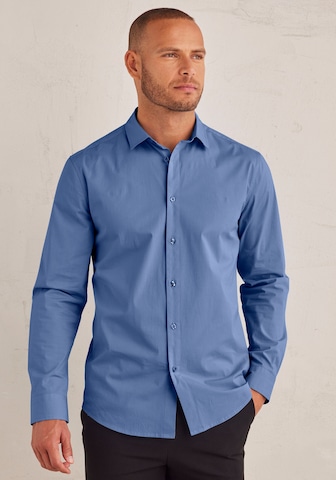 Coupe regular Chemise business JOHN DEVIN en bleu : devant