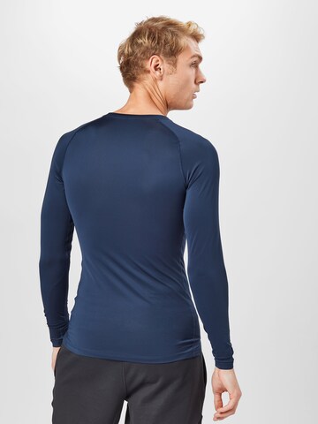 NIKE - Ajuste regular Camiseta térmica en azul