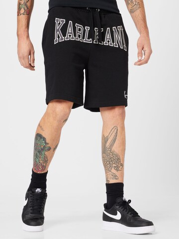 Karl Kani Regular Pants in Black: front