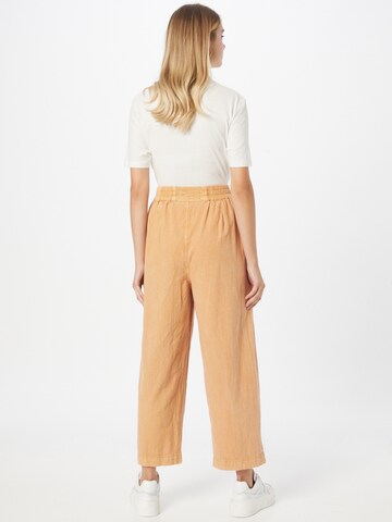 Free People Loose fit Trousers 'BE THE CHANGE' in Orange