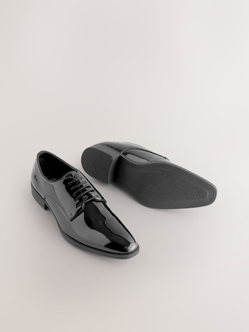 Next - Zapatos con cordón en negro