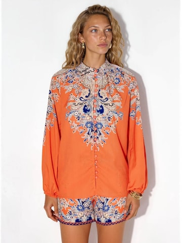 Completo pantalone di MSN Collection in arancione: frontale