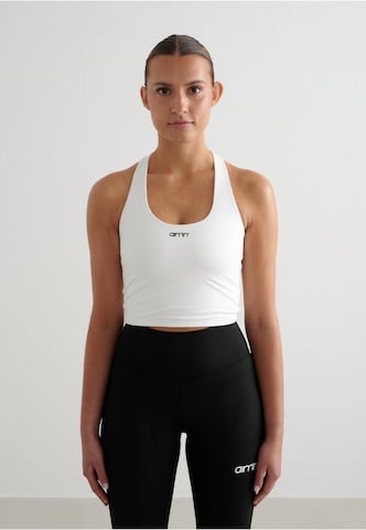 Bustino Reggiseno sportivo 'Essential' di Aim'n in bianco: frontale