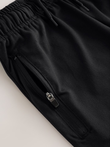 Next - regular Pantalón en negro